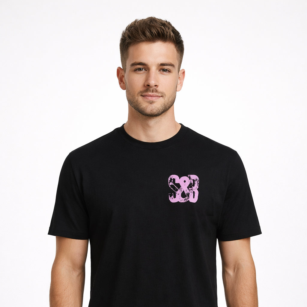 Front view of Fear City T-Shirt in black with chest logo worn by model by Sauce & Brown