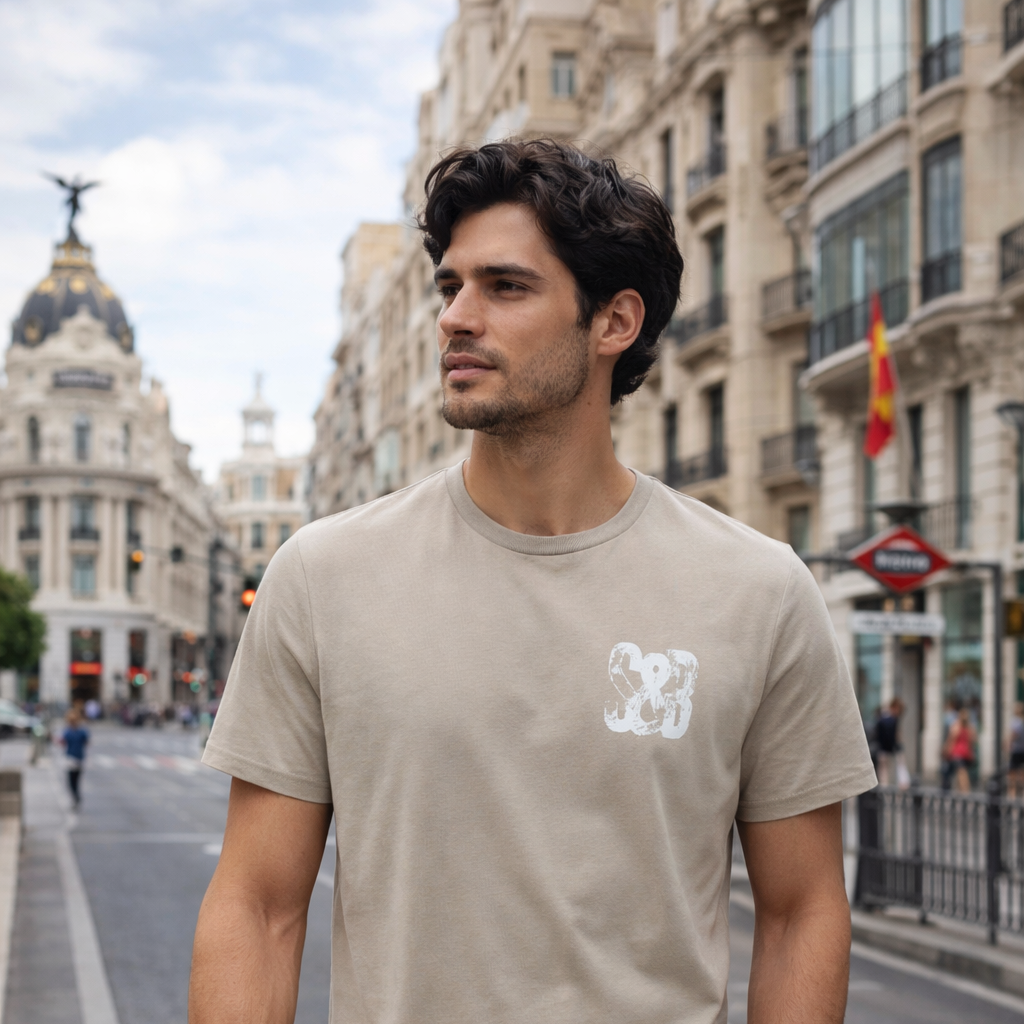 Model wearing Stone Press Printed Tee in stone outdoors by Sauce & Brown